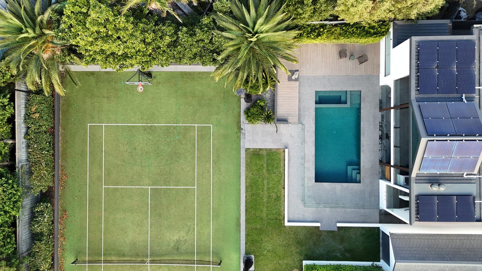 Full backyard renovation with pool, court and lawns
